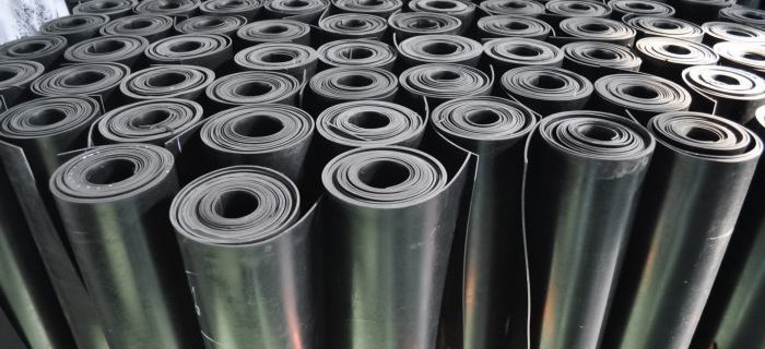 rolls of black rubber sheet