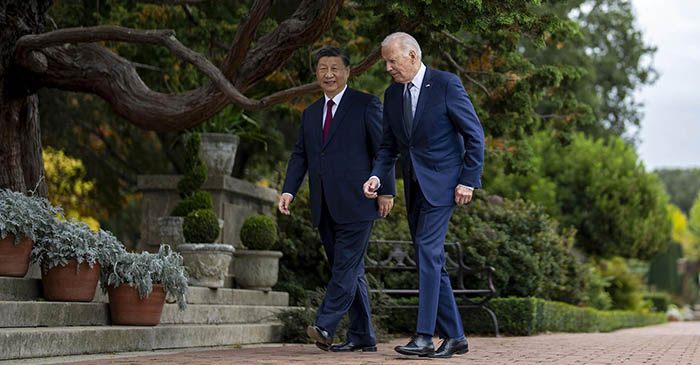 President Joe Biden and President Xi Jinping of China walk through the garden at the end of their meetings at the Filoli estate, in Woodside, Calif., on Nov. 15, 2023, during the Asia-Pacific Economic Cooperation summit. (Doug Mills/The New York Times)