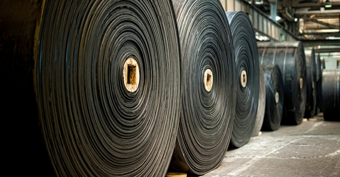 Rubber rolls. Factory for manufacturing rubber conveyor belts.